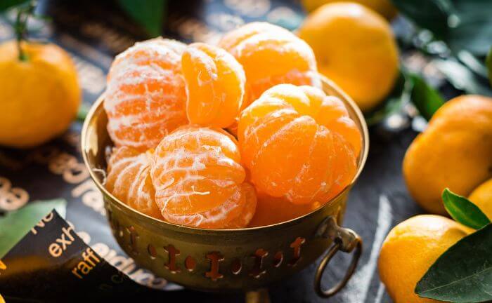 Frutas naranjas para el fitness